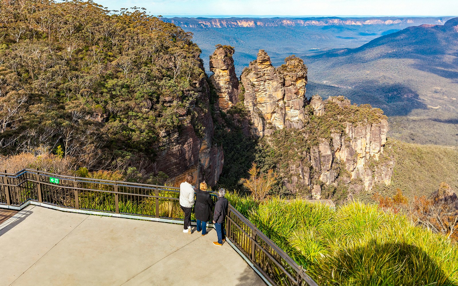 Visitors at Echo Point viewing the Three Sisters rock formation, Blue Mountains, Australia.