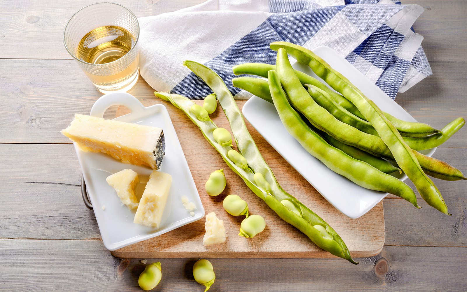 Broad beans, white wine, and pecorino cheese platter in Italy.