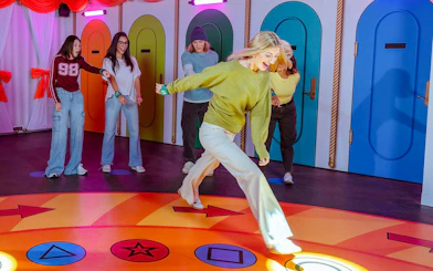 Guests participating in Squid Game activity at Netflix House Philadelphia.