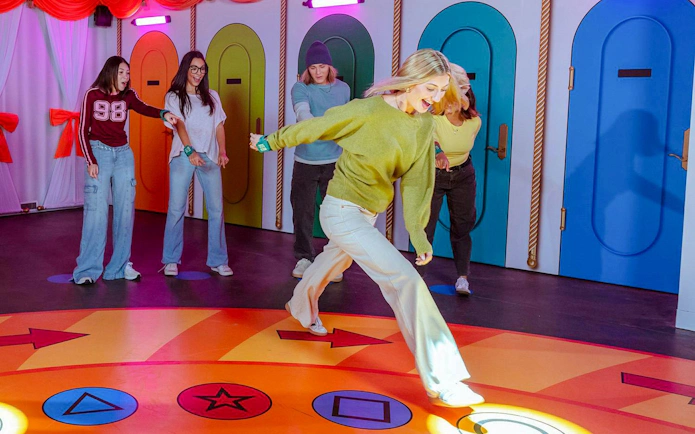 Guests participating in Squid Game activity at Netflix House Philadelphia.