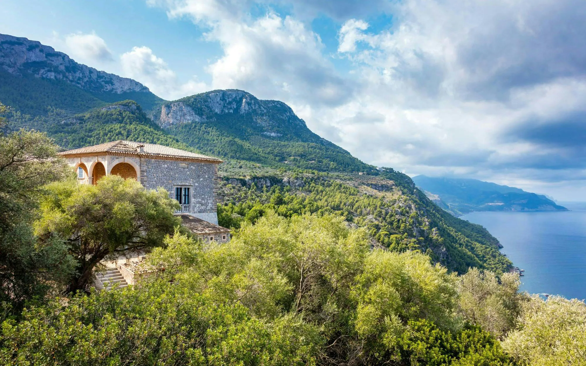 Son Marroig villa overlooking the Tramuntana mountains and Mediterranean Sea in Mallorca, Spain.