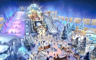 Indoor snow park with slides and snowy landscape, Snow Abu Dhabi experience, Abu Dhabi.