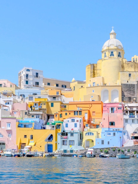 Colorful buildings along the waterfront of Procida Island, Italy.