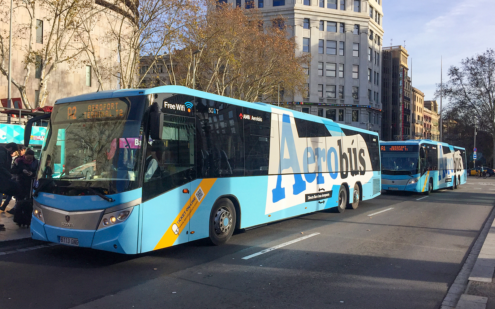 Aerobus traveling through Barcelona city center, offering round-trip service from Barcelona Airport.