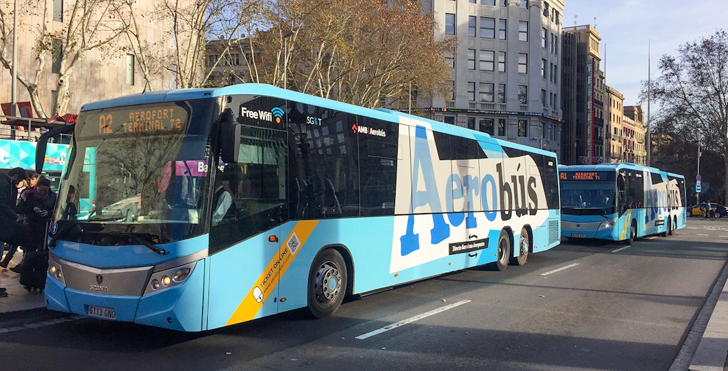 Aerobus traveling through Barcelona city center, offering round-trip service from Barcelona Airport.