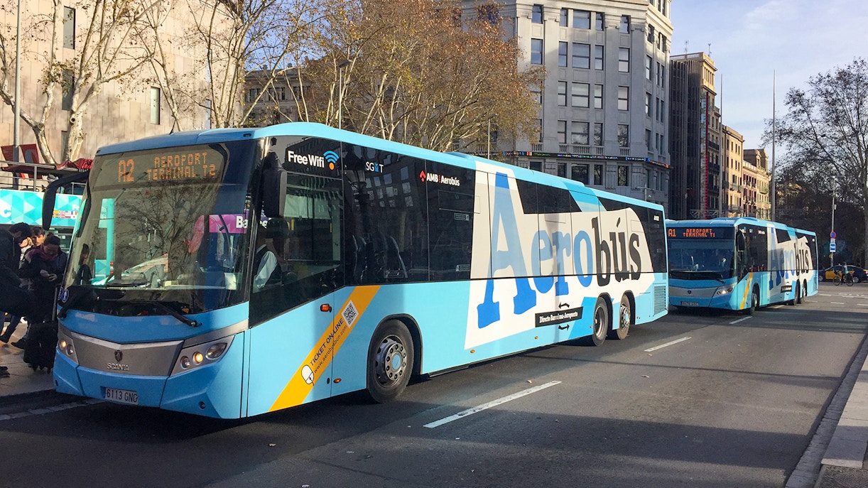 Aerobus traveling through Barcelona city center, offering round-trip service from Barcelona Airport.