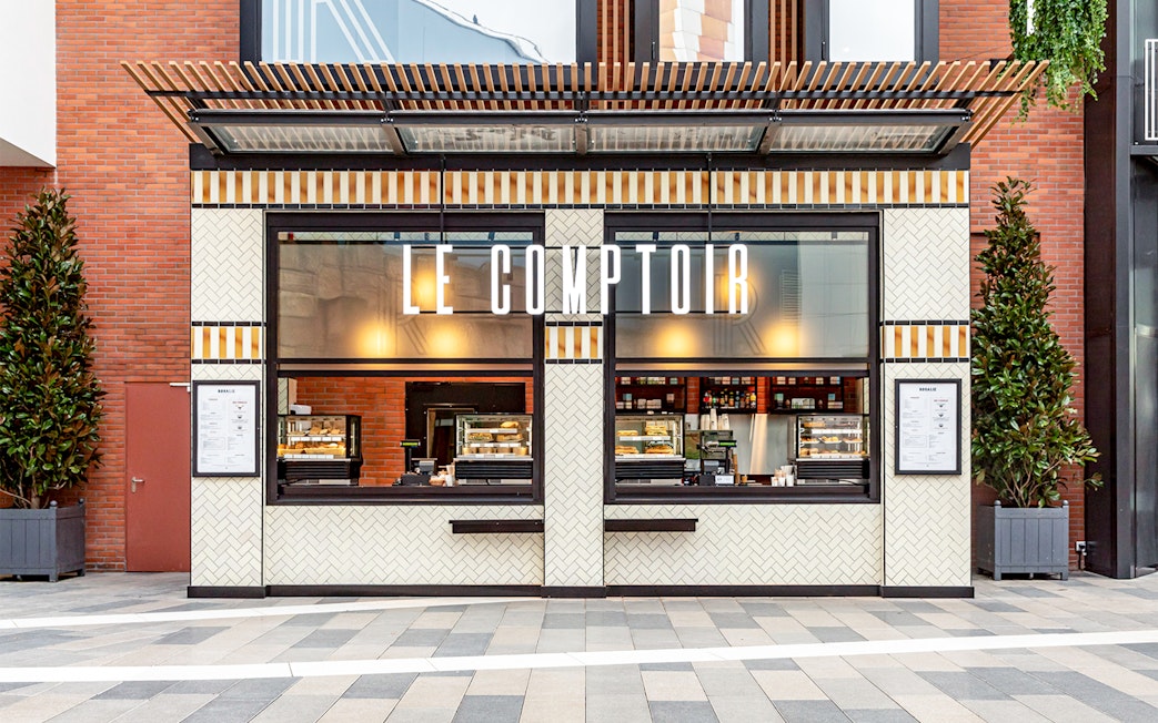 Facade of Rosalie’s Snack & Go with menu display and food counters.