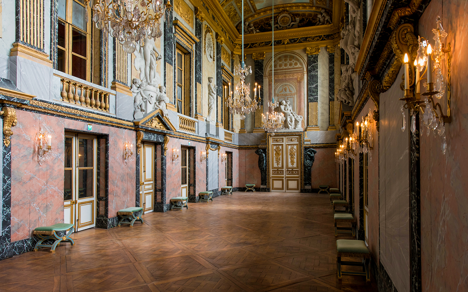 Outside entrance of Royal Opera House in Versailles with ornate architecture and grand facade.