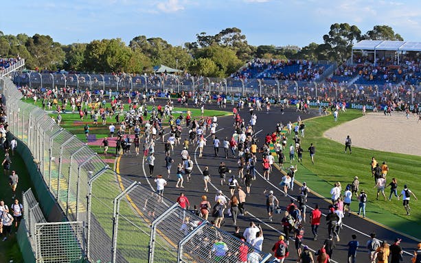 Crowd walking on the track at Formula 1 Australian Grand Prix 2023 in Melbourne.