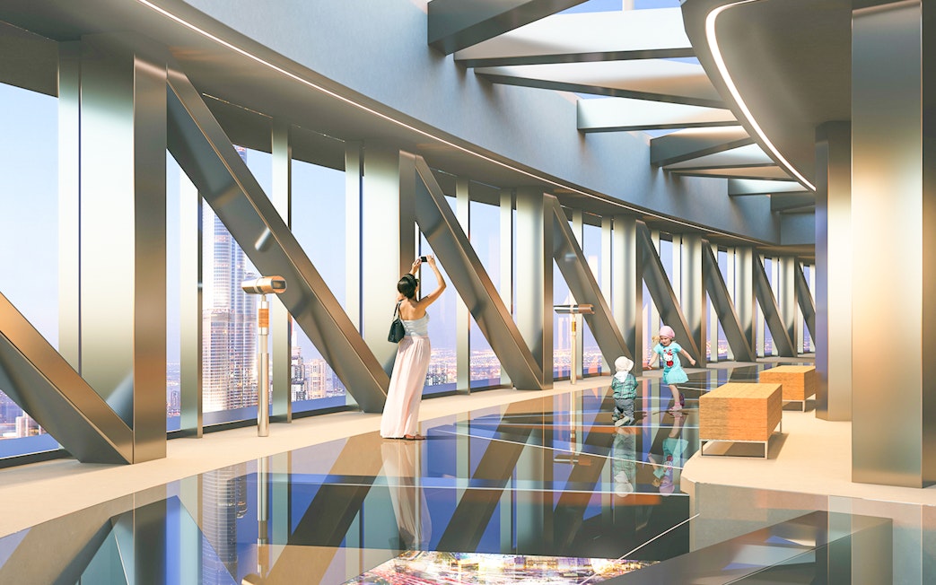 Visitors enjoying views from Burj Khalifa At The Top L124, Dubai.