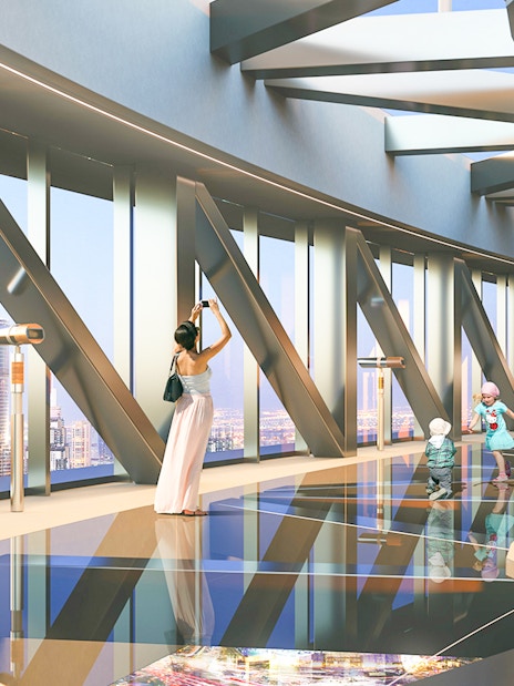 Visitors enjoying views from Burj Khalifa At The Top L124, Dubai.