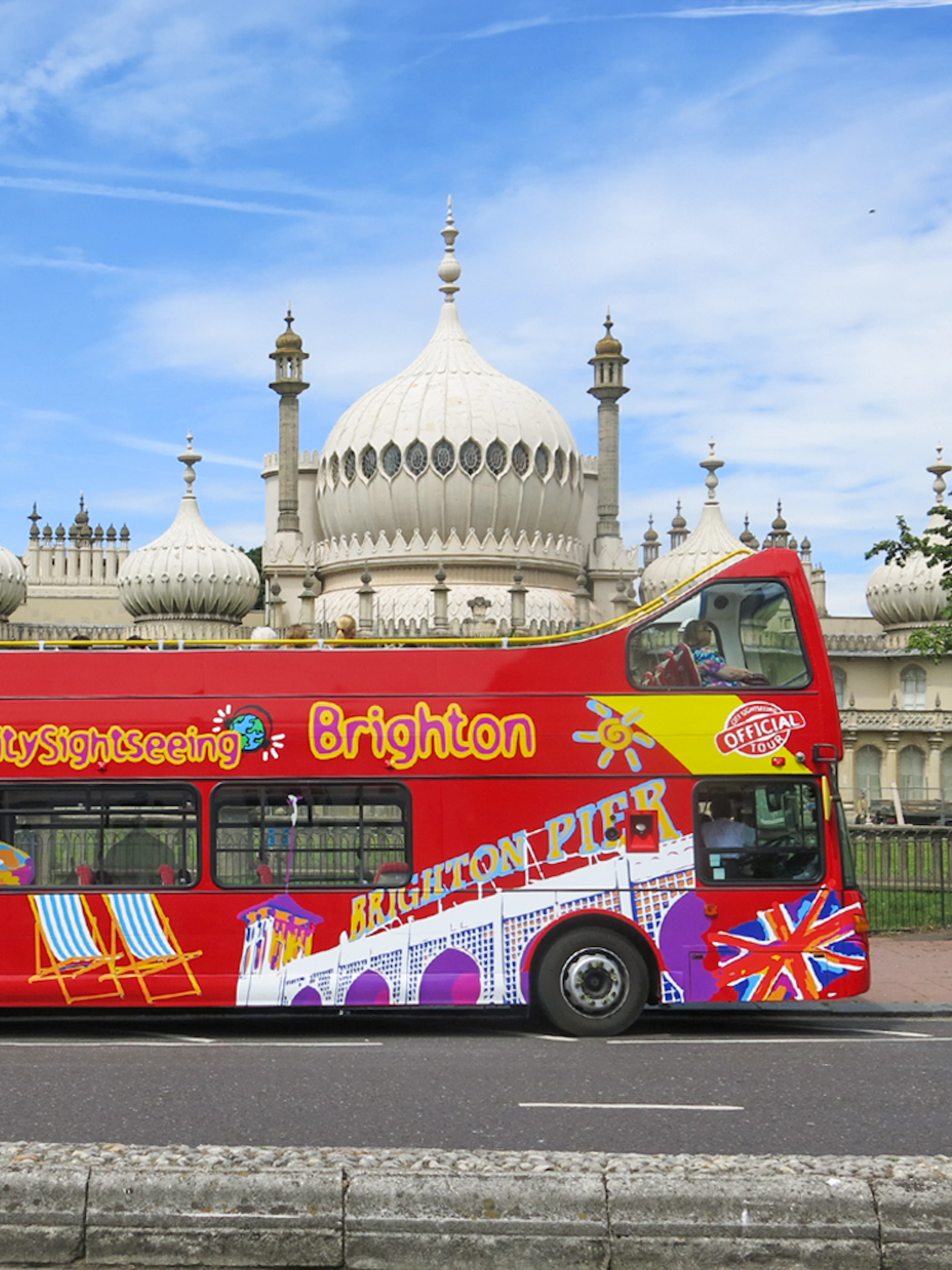 Brighton hop-on hop-off bus in front of the Royal Pavilion.
