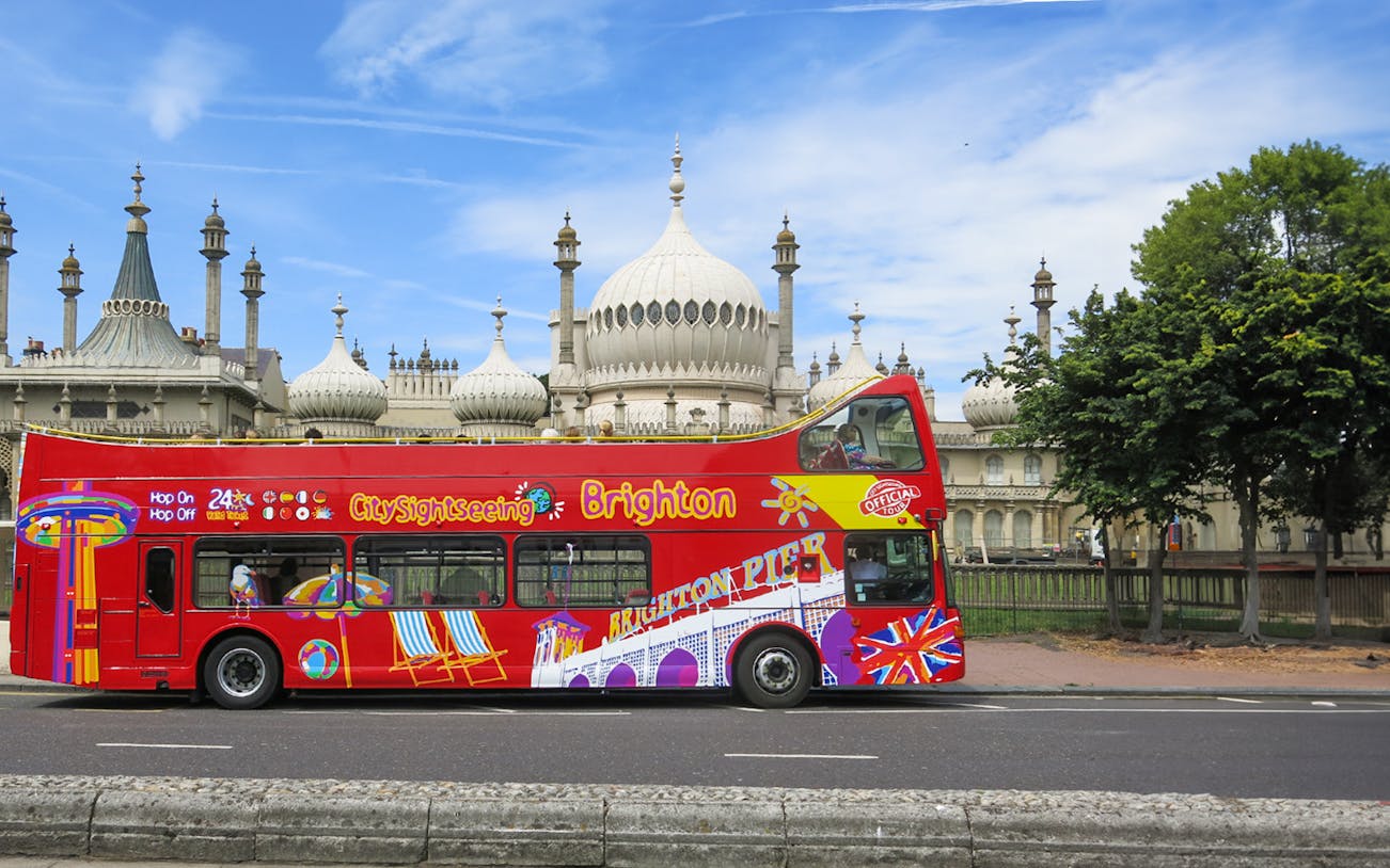 Brighton hop-on hop-off bus in front of the Royal Pavilion.