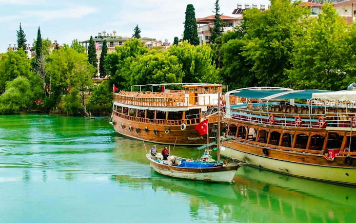 Cruise boats on the Manavgat River during Side Manavgat River Cruise tour.