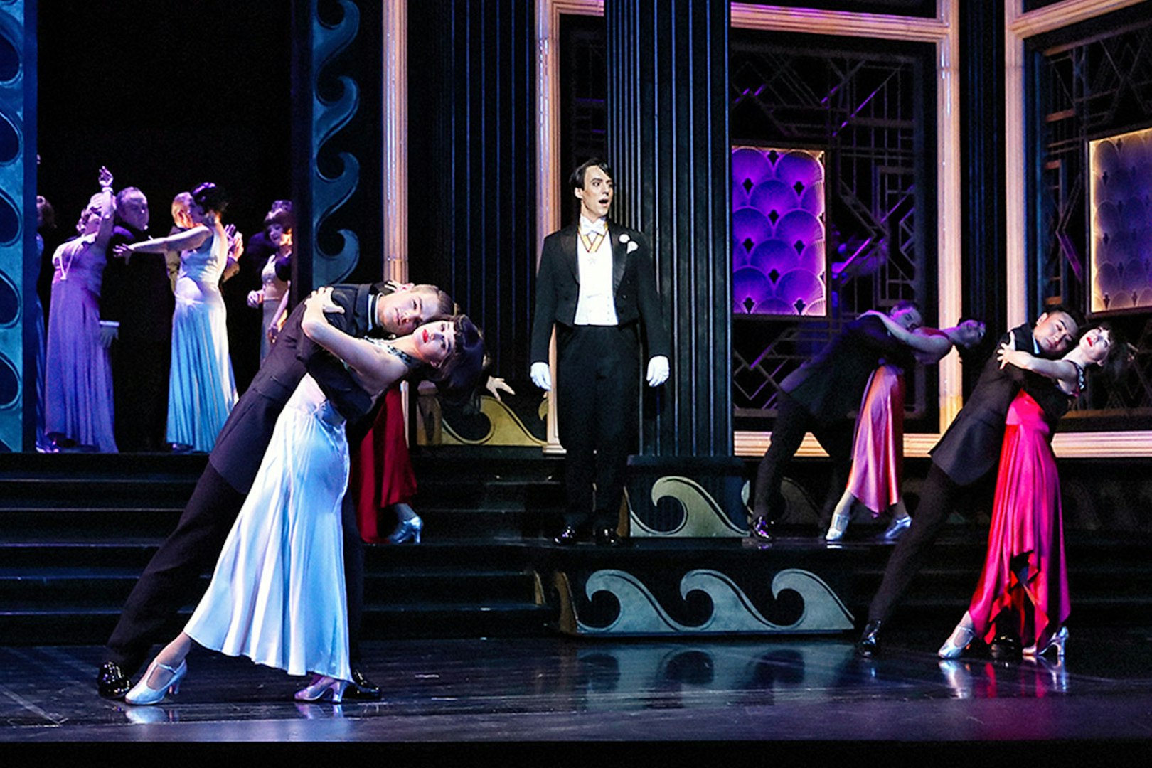 Theatrical performance of The Merry Widow in Sydney with dancers in elegant attire.