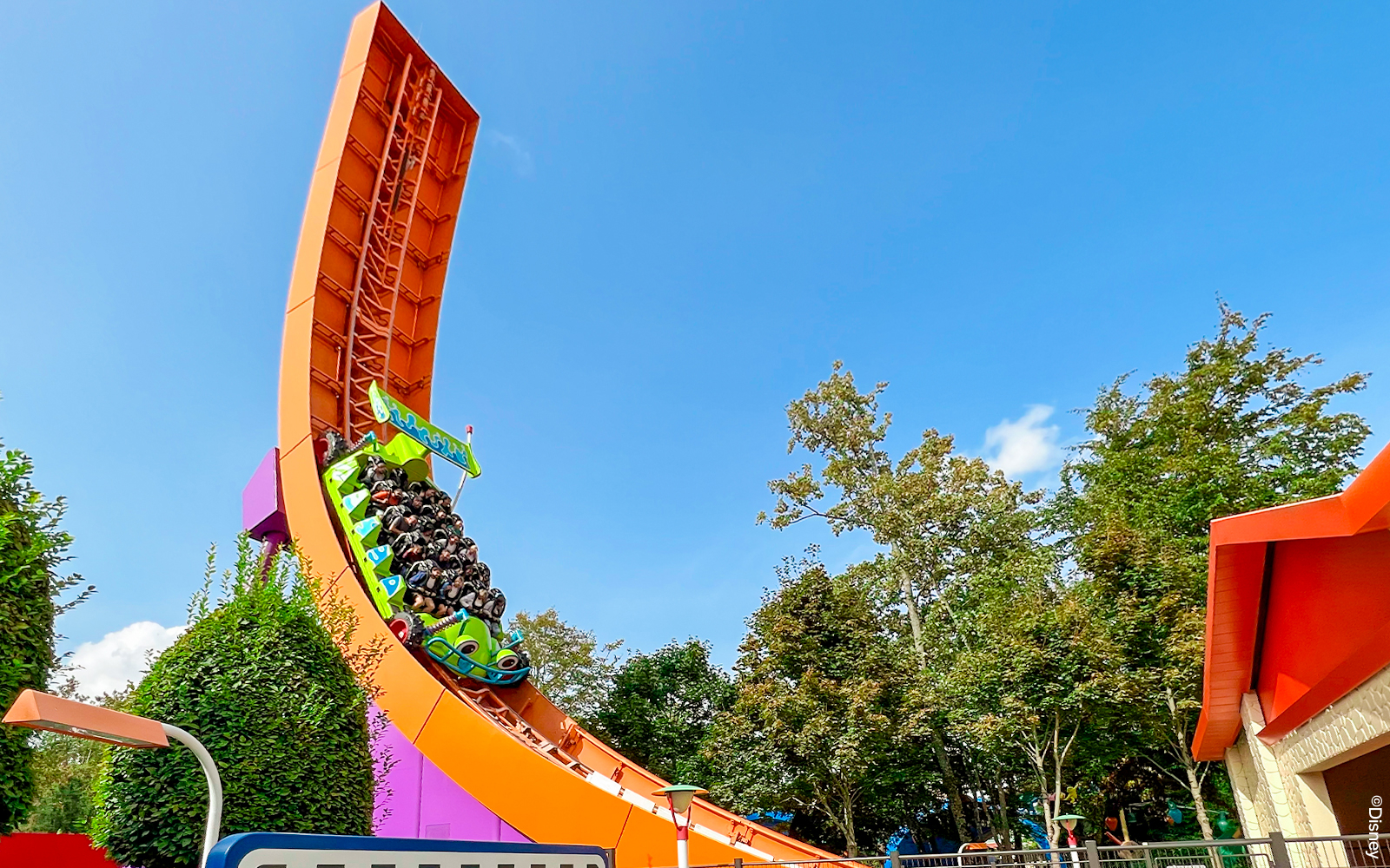 RC Racer ride at Disneyland Paris, Walt Disney Studios Park, with guests on a steep track.
