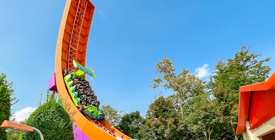 RC Racer ride at Disneyland Paris, Walt Disney Studios Park, with guests on a steep track.