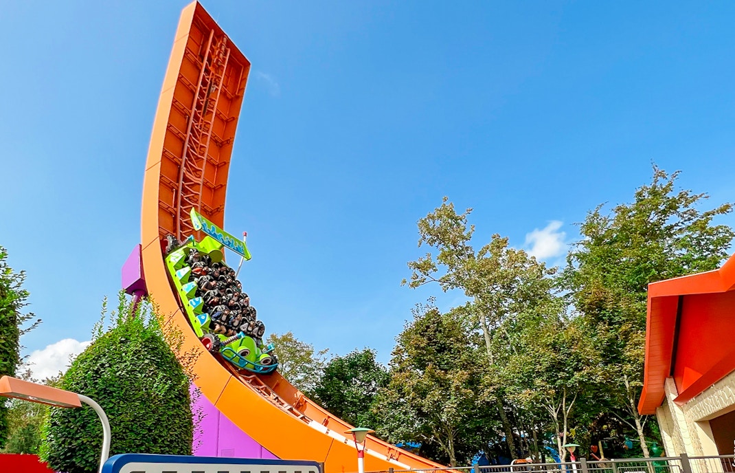 RC Racer ride at Disneyland Paris, Walt Disney Studios Park, with guests on a steep track.