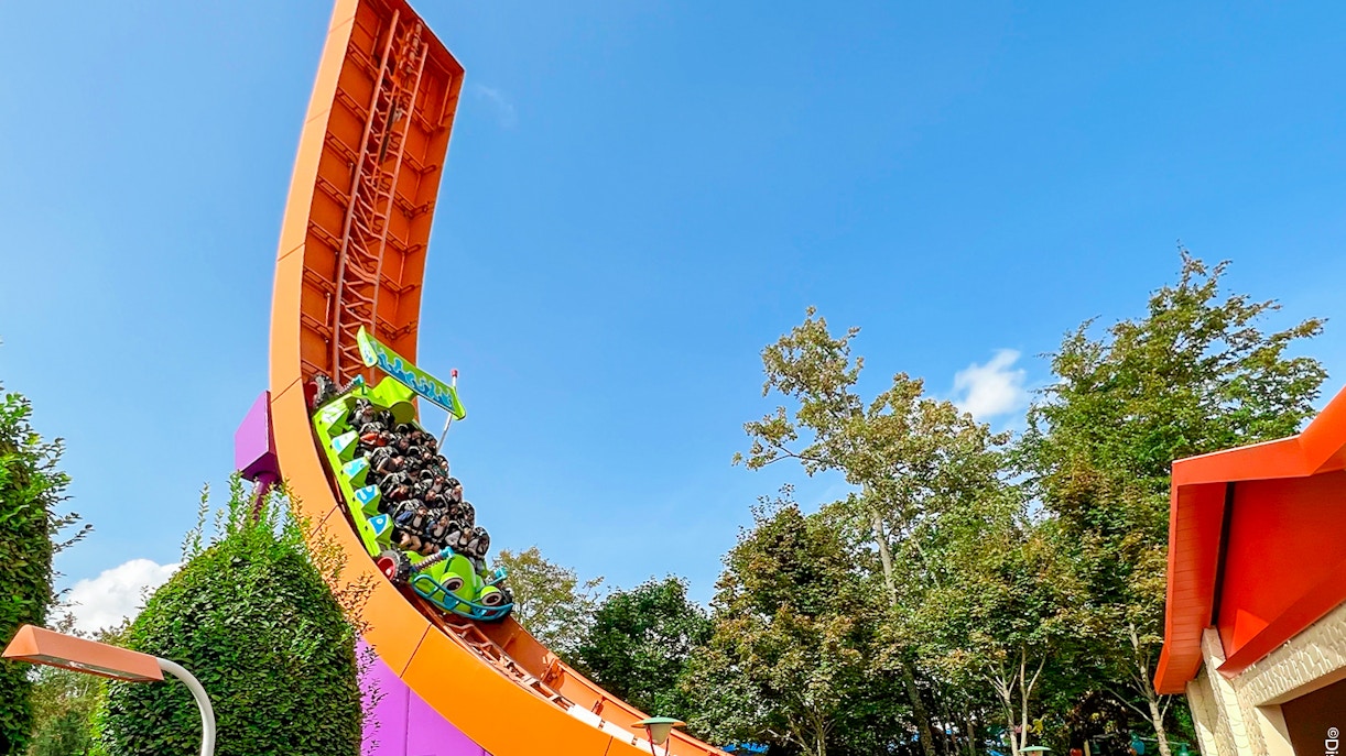 RC Racer ride at Disneyland Paris, Walt Disney Studios Park, with guests on a steep track.