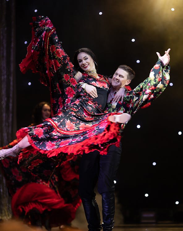 Flamenco dancers performing on stage in Córdoba, Spain.