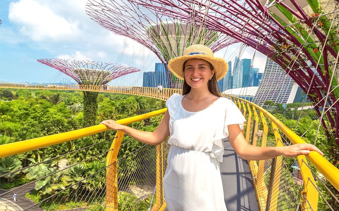 Woman posing at Supertree Grove, Gardens by the Bay, Singapore.