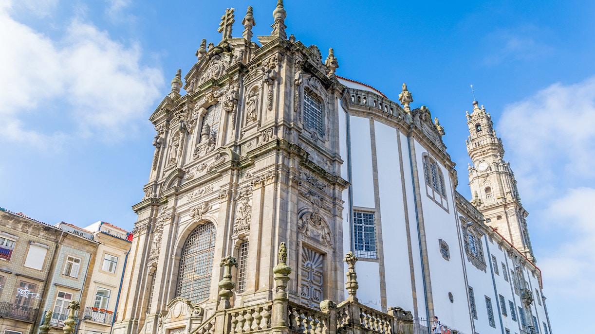 Church and Tower of the Clerigos in Porto, Portugal, featuring ornate Baroque architecture.