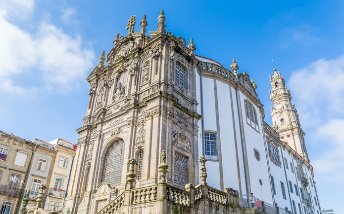 Church and Tower of the Clerigos in Porto, Portugal, featuring ornate Baroque architecture.