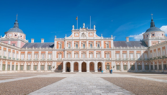 Royal Palace of Aranjuez facade with gardens, Madrid, Spain.