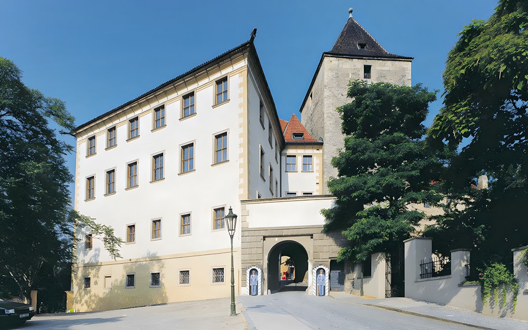 Lobkowicz Palace Museum exterior with visitors exploring historic architecture in Prague.