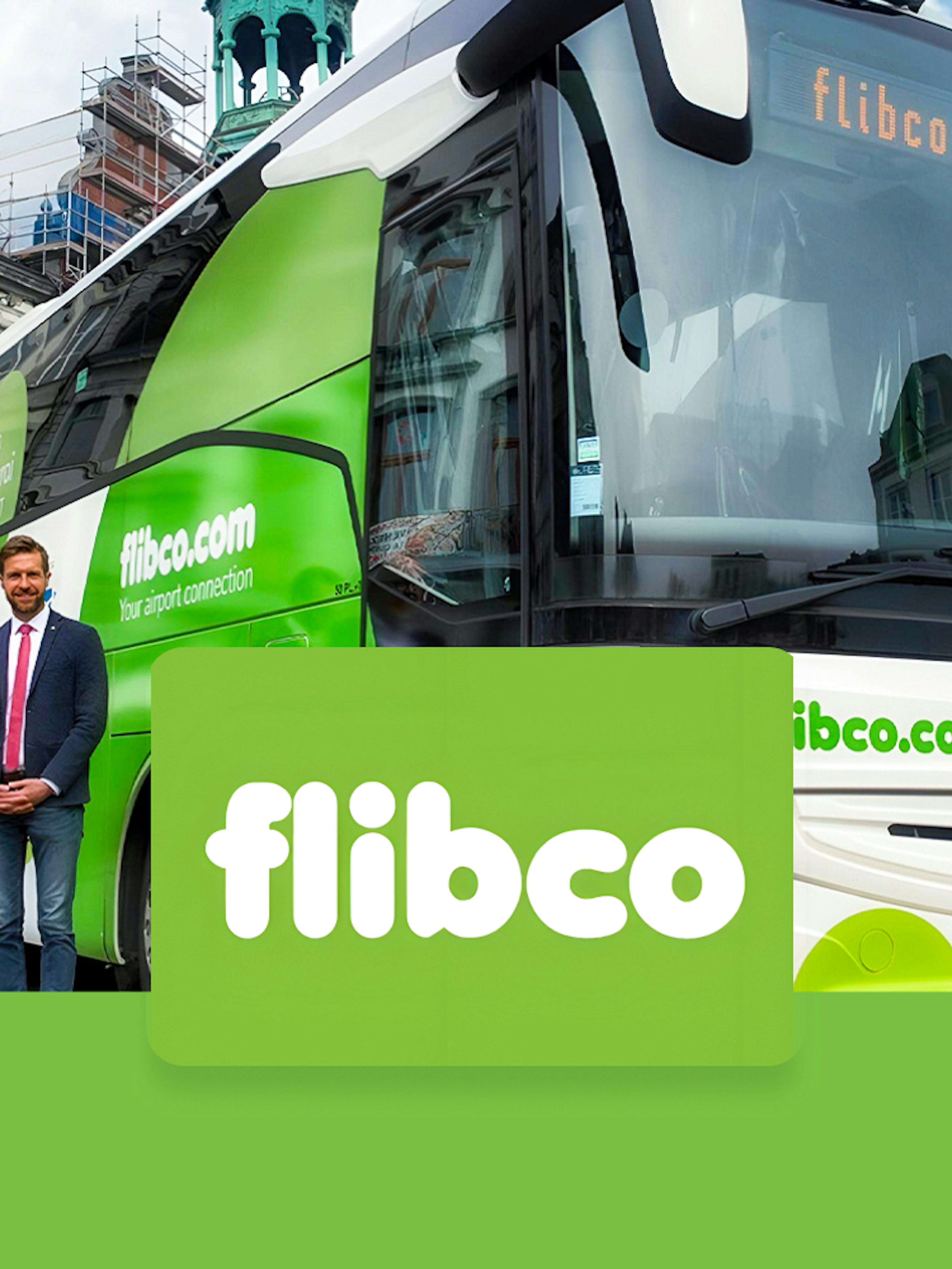 Flibco shuttle bus parked in front of a historic building, offering transport from Frankfurt Hahn Airport to Frankfurt City.