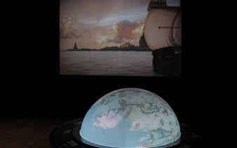 Interactive globe and ship projection at World of Discoveries exhibition.