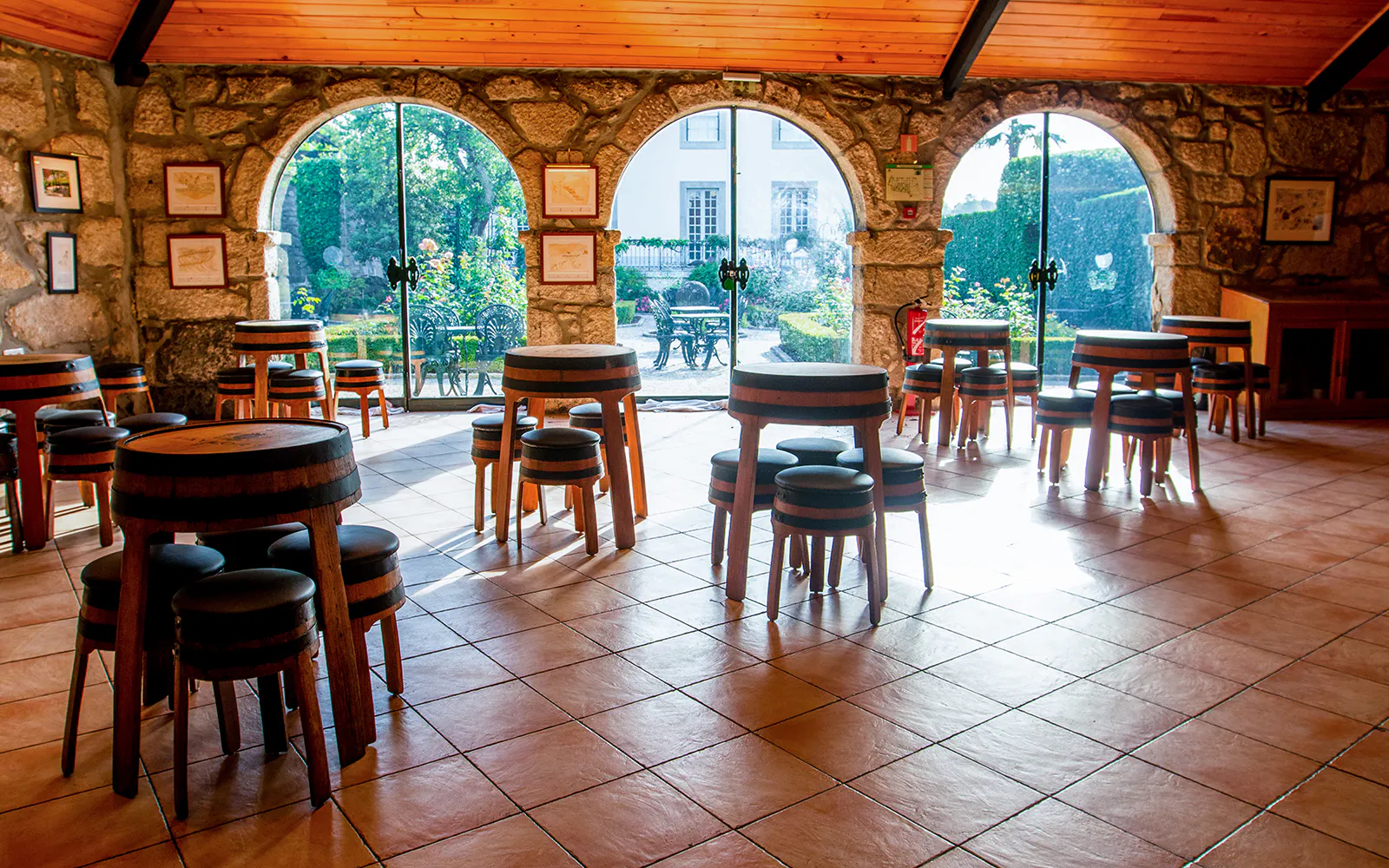 Tasting room with barrel tables at Taylor's Port Cellars in Porto.
