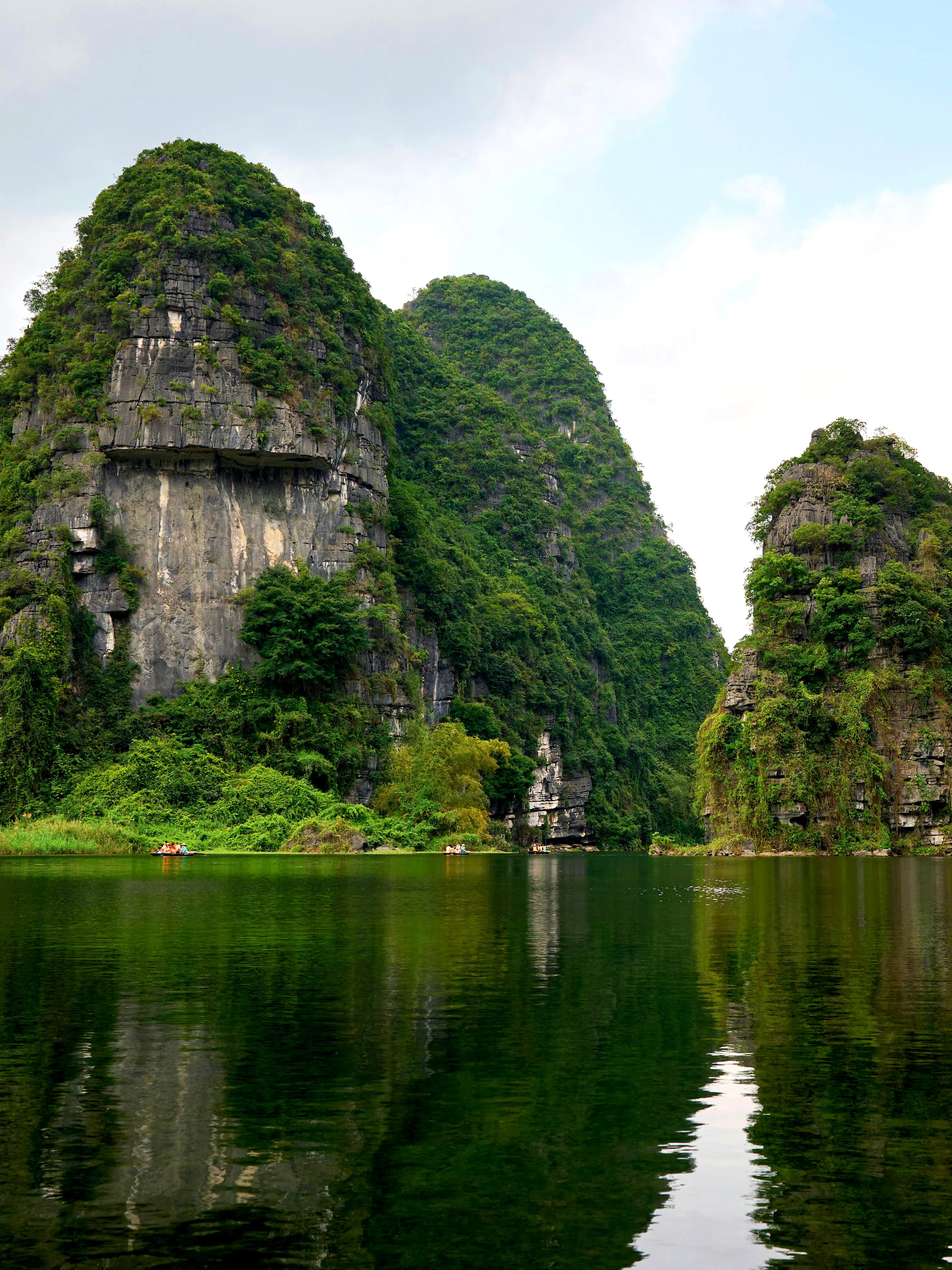 Trang An Eco Tourist Complex limestone karsts and river in Vietnam.