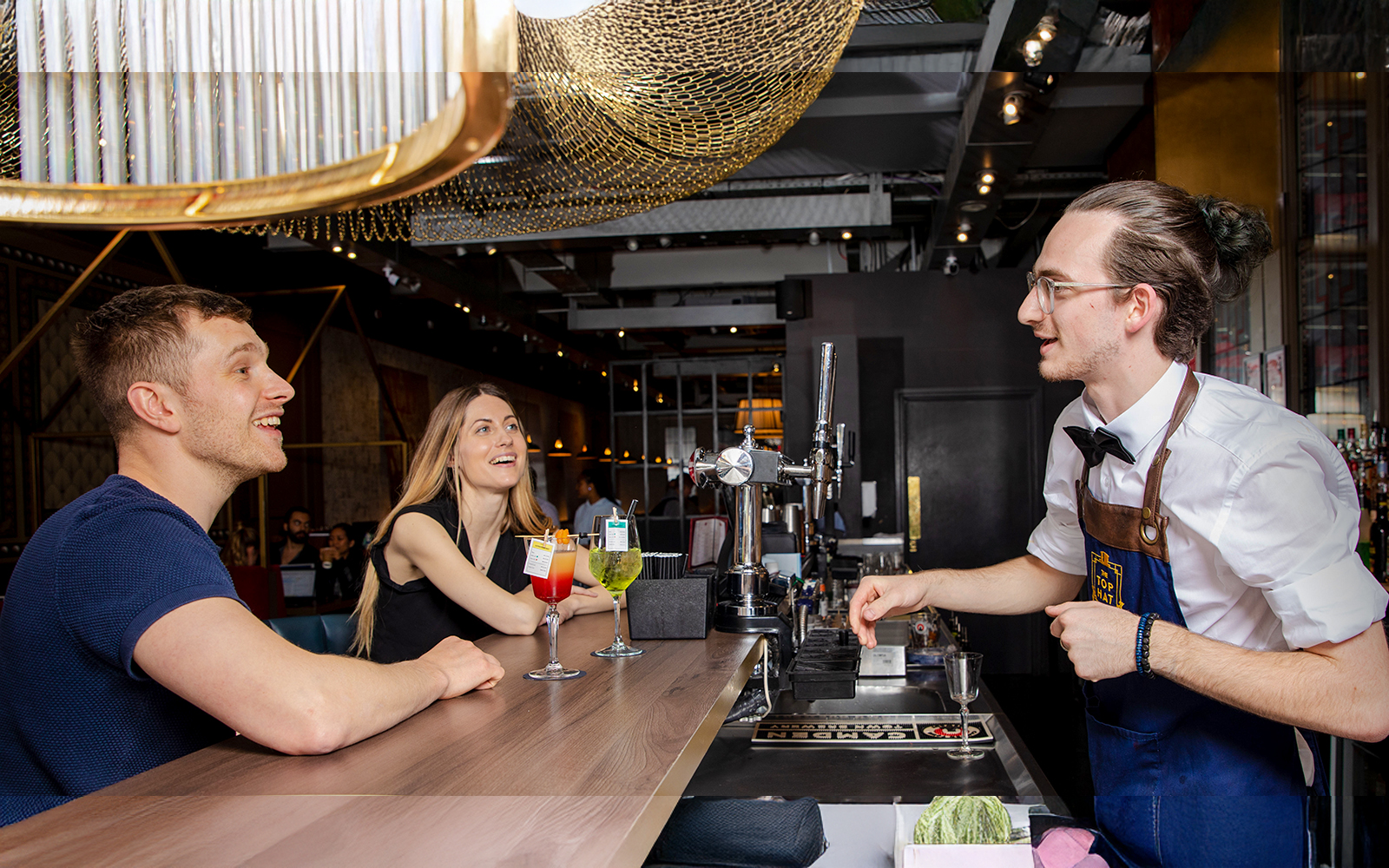Monopoly Lifesized London dining table with themed food and beverages.