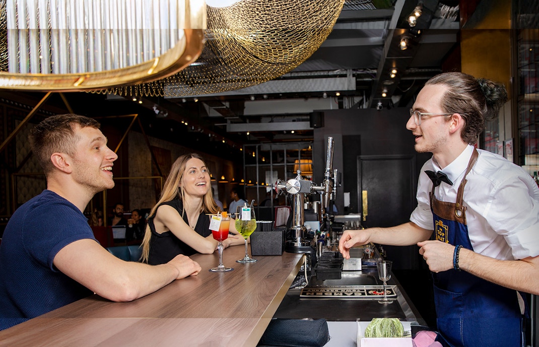 Monopoly Lifesized London dining table with themed food and beverages.