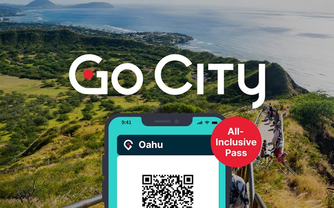 Oahu landscape with Go City All-Inclusive Pass QR code on a smartphone.