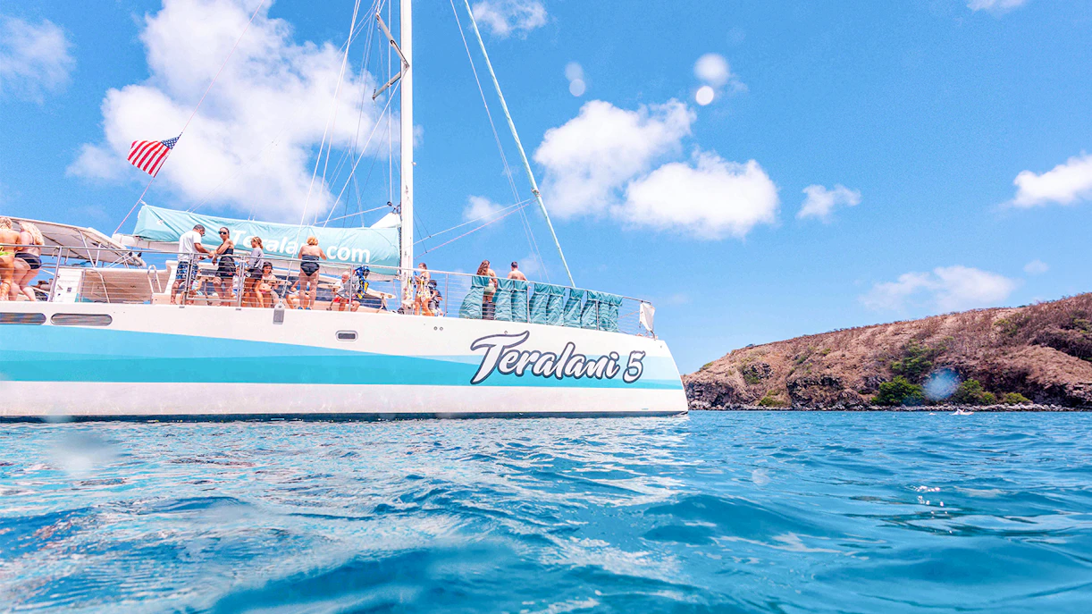 Luxury sailboat with tourists on a snorkel tour in Maui, Hawaii.