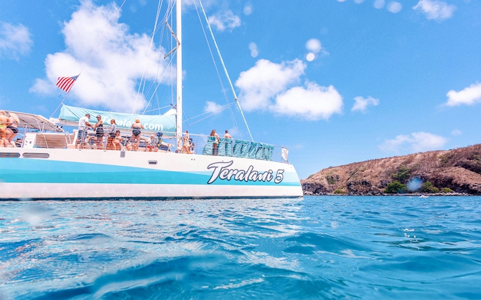 Luxury sailboat with tourists on a snorkel tour in Maui, Hawaii.