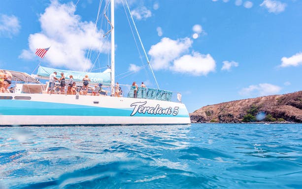 Luxury sailboat with tourists on a snorkel tour in Maui, Hawaii.