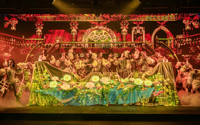 Performers in period costumes on stage at Sala Scala, Gran Canaria.
