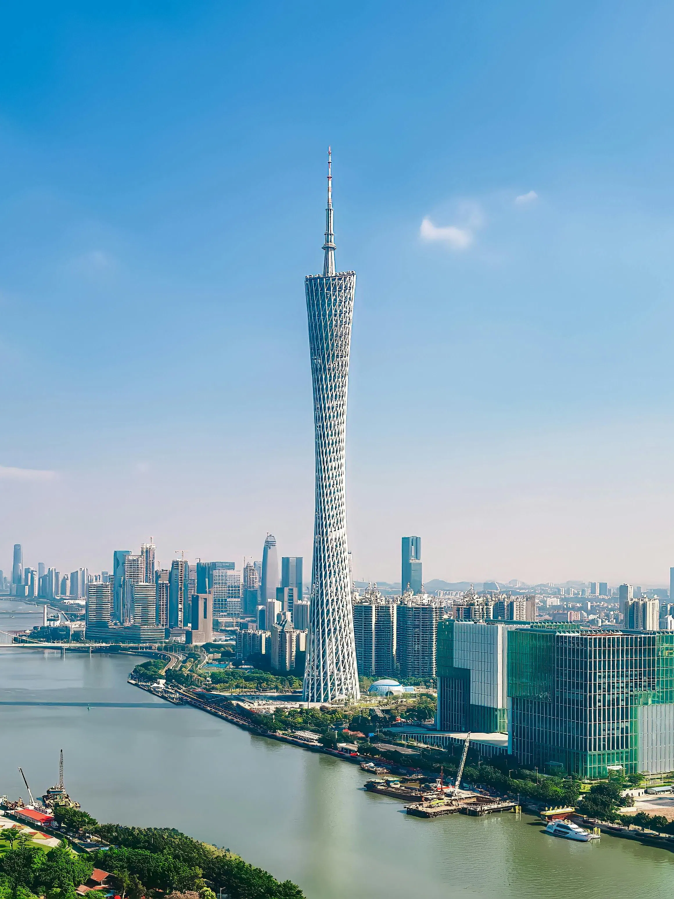 Guangzhou skyline featuring Canton Tower beside the Pearl River.