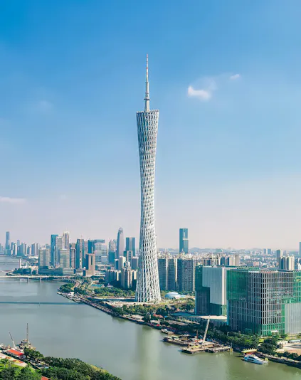 Guangzhou skyline featuring Canton Tower beside the Pearl River.