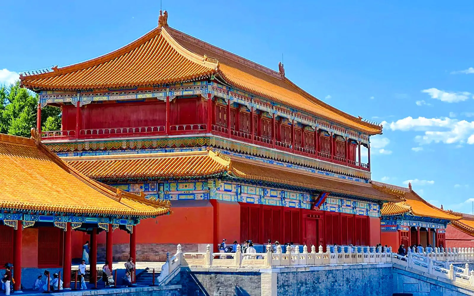 Traditional building in the Forbidden City, Beijing, China, with ornate roof and vibrant colors.