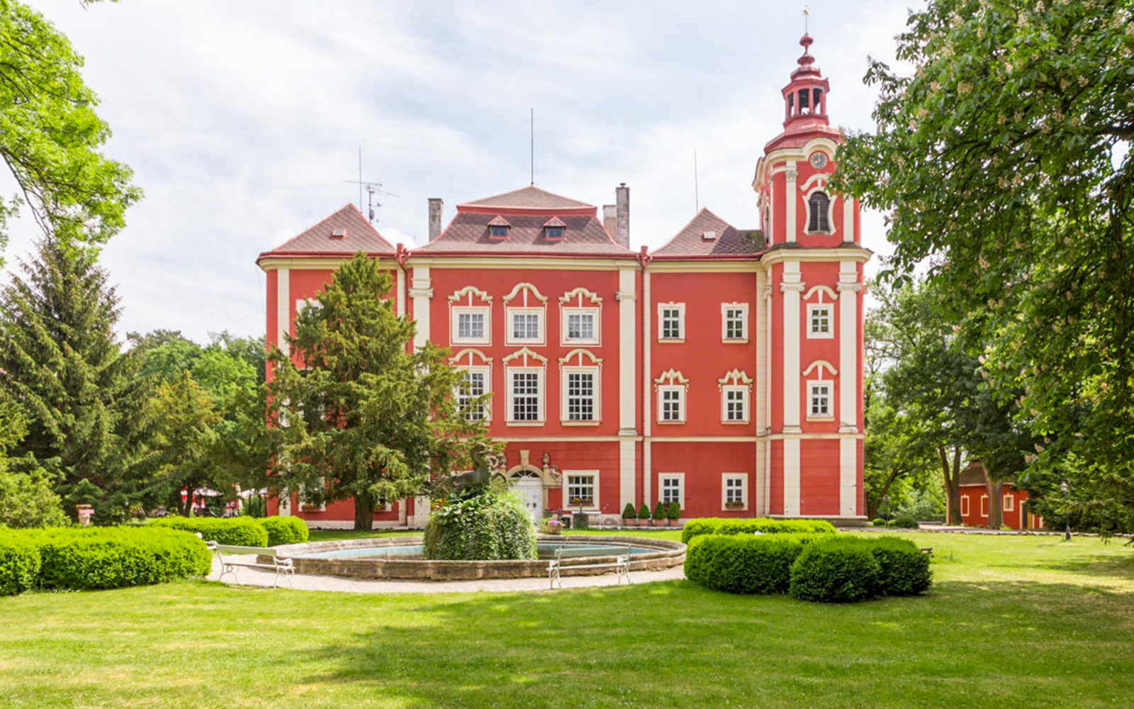 Detenice Castle exterior with gardens in Prague.