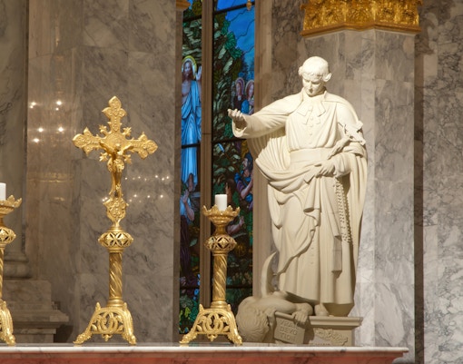 Crucifix Christian cross , Religious symbol of Christianity .