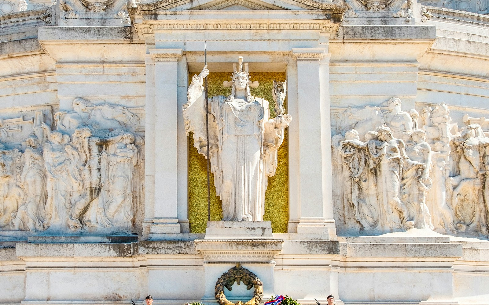 Tomb of the Unknown Soldier at Altare della Patria, Rome, with detailed sculptures.