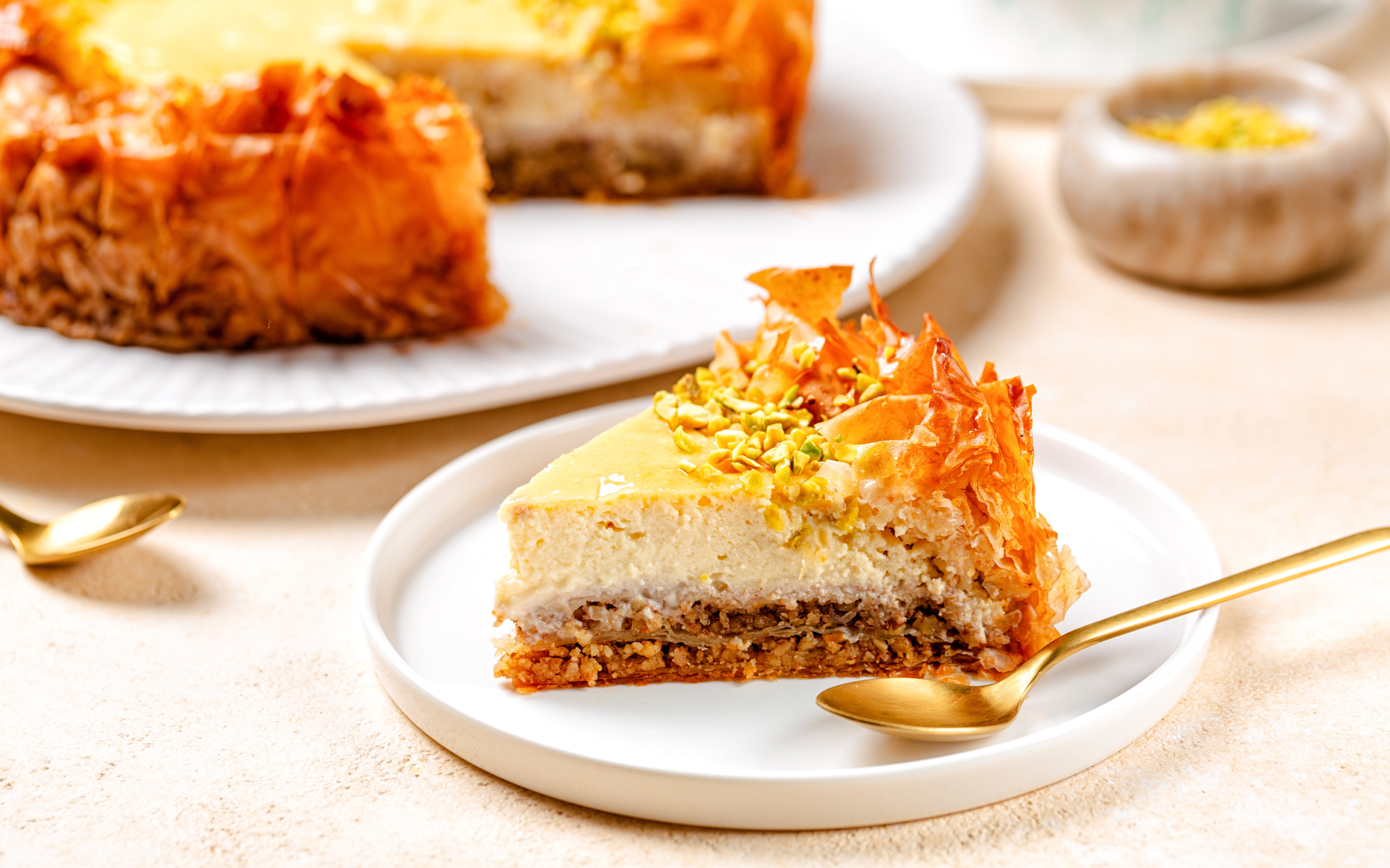Baklava cheesecake slice with pistachios at Delphi Restaurant.
