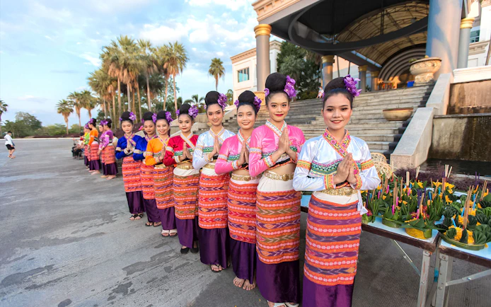 Traditional dancers in colorful attire at Yeepeng Lanna Festival 2023, Chiang Mai.