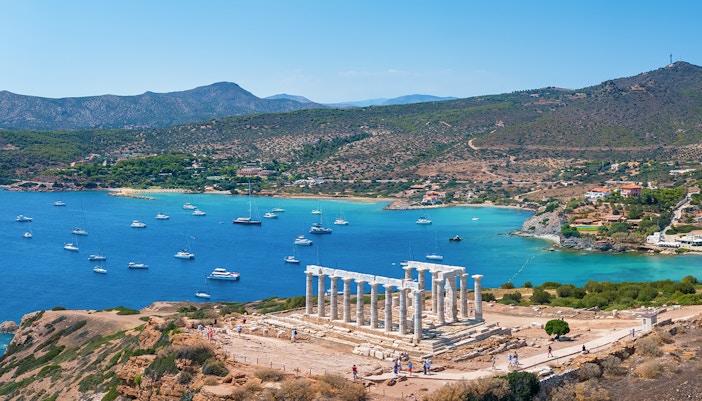 Temple of Poseidon at Cape Sounion with panoramic sea view, Athens, Greece.