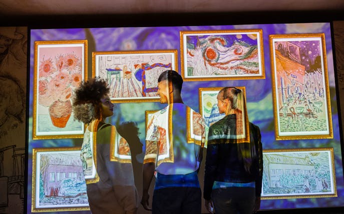 Visitors viewing Van Gogh paintings at The Immersive Experience, Singapore.